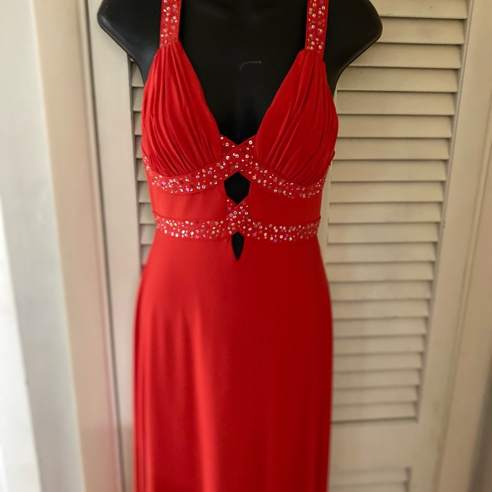 Reddish orange gown